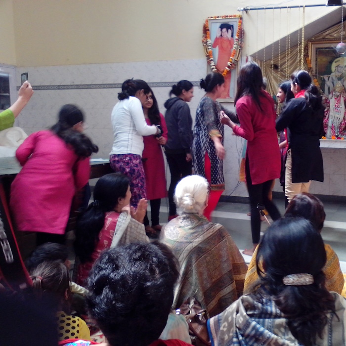 Attending Bhajan by college students  at Public Temple